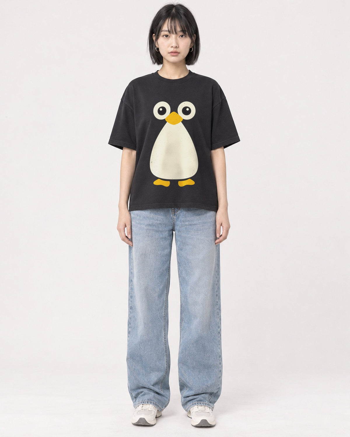 Mockup Boxy Heavyweight Tee Black female full-body 11