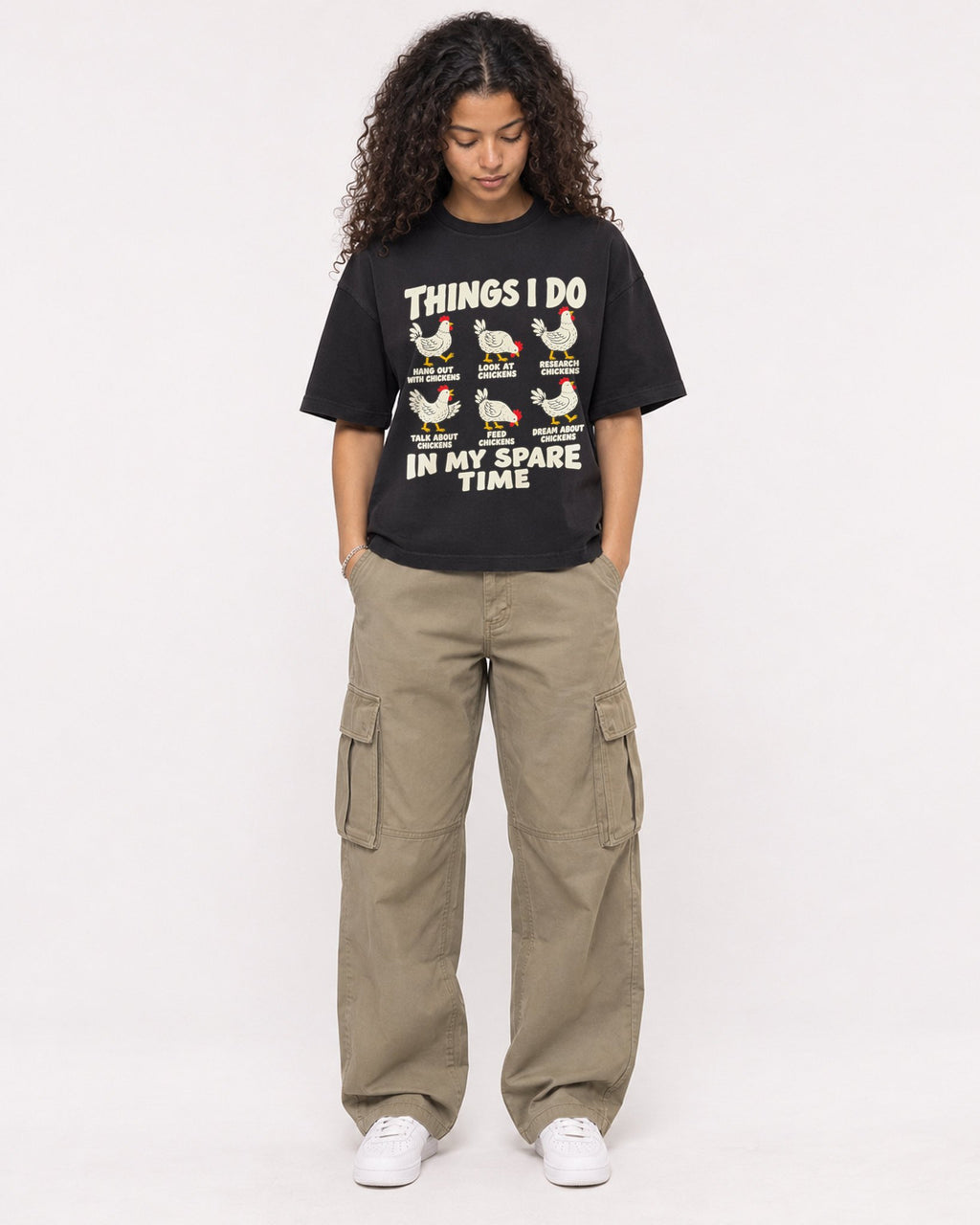 Mockup Boxy Heavyweight Tee Black female full-body 10