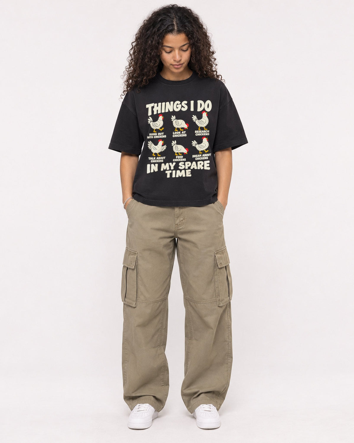 Mockup Boxy Heavyweight Tee Black female full-body 10