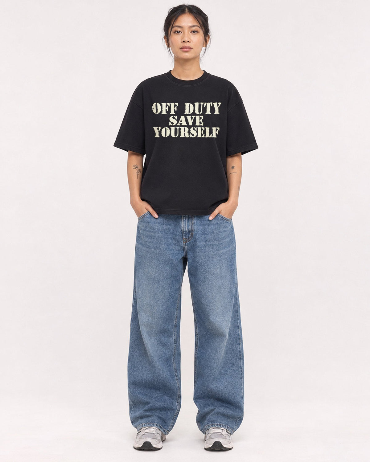 Mockup Boxy Heavyweight Tee Black female full-body 12