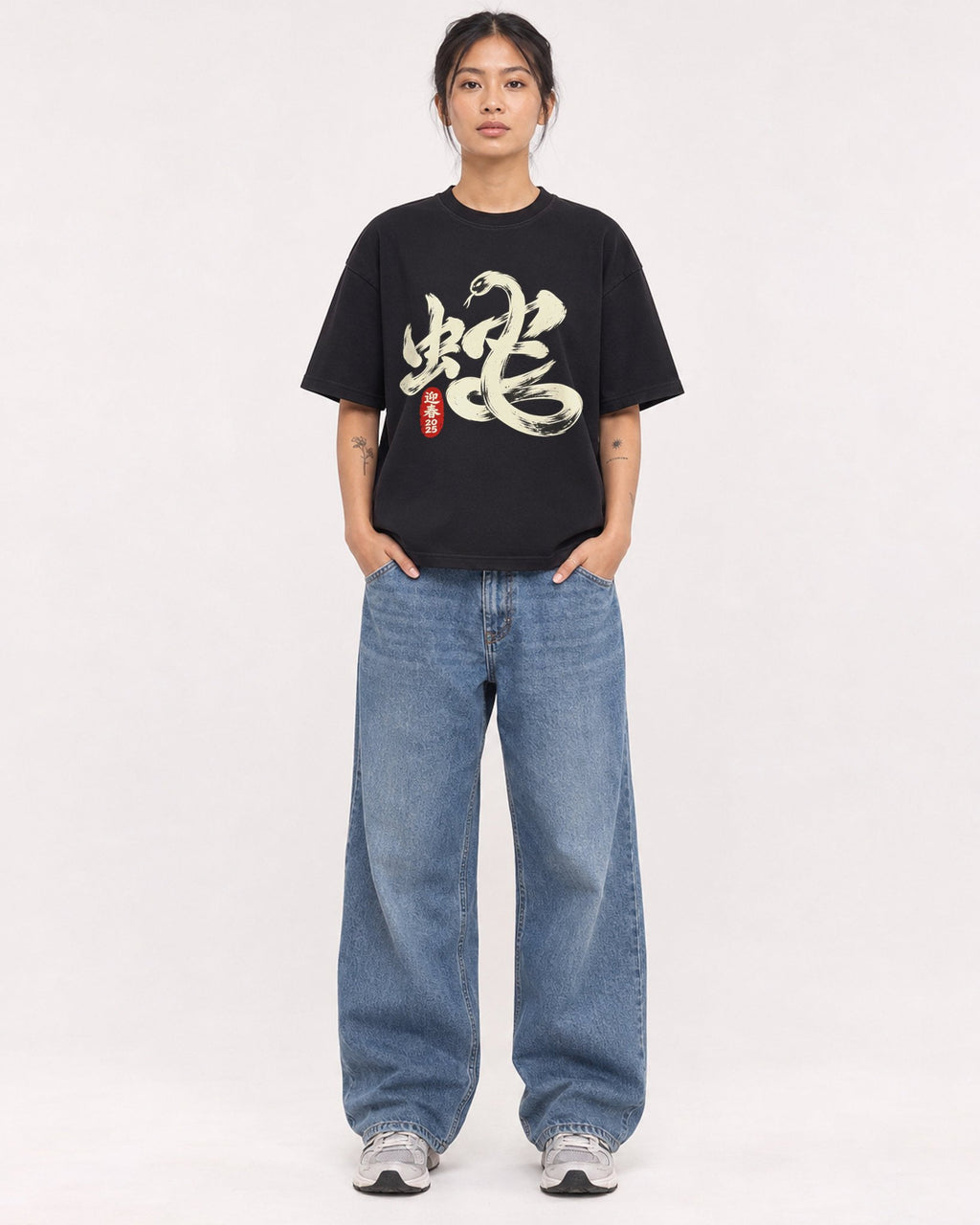 Mockup Boxy Heavyweight Tee Black female full-body 12
