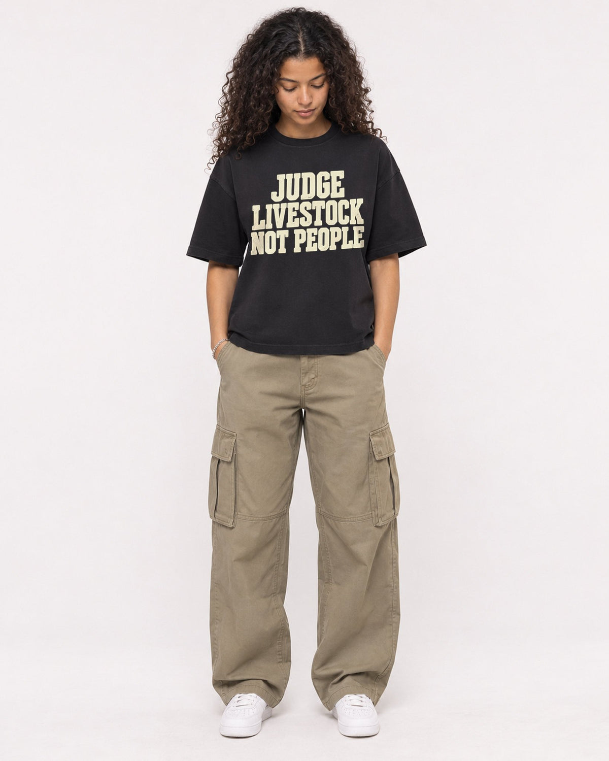 Mockup Boxy Heavyweight Tee Black female full-body 10