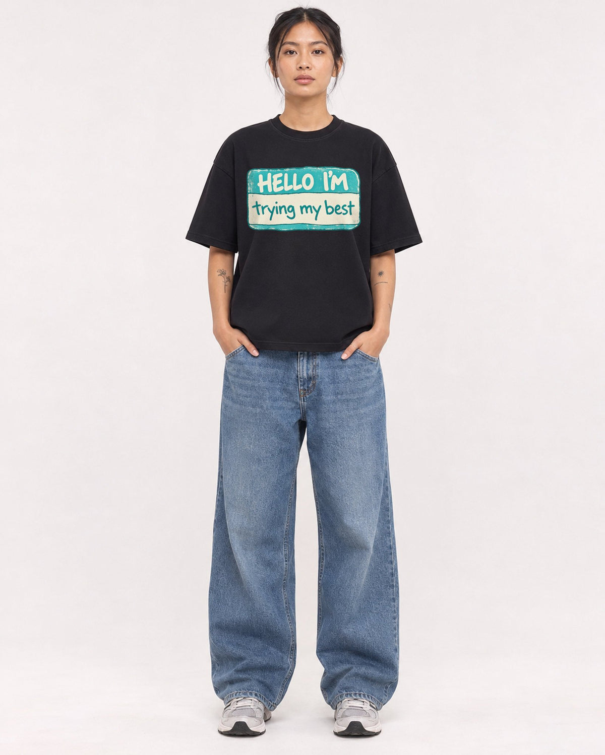 Mockup Boxy Heavyweight Tee Black female full-body 12