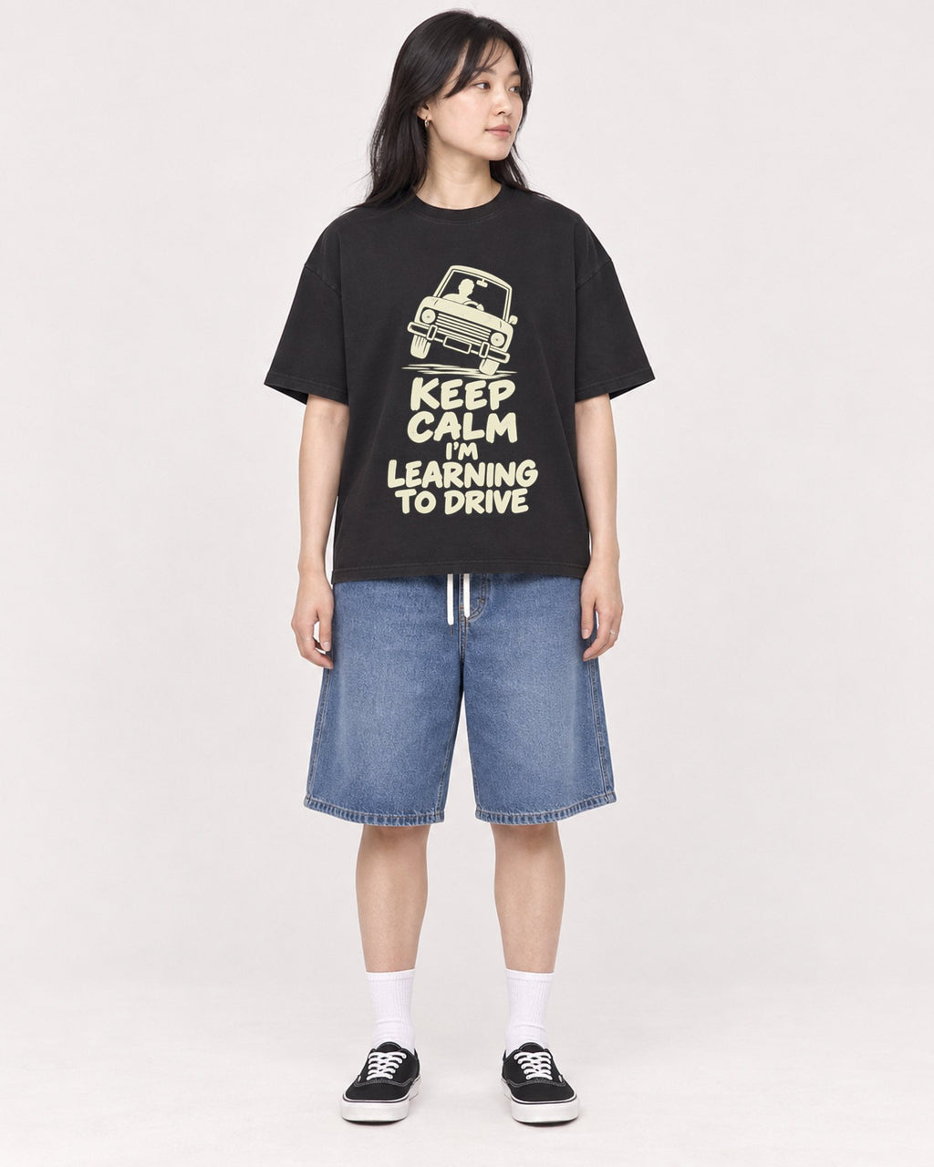 Mockup Boxy Heavyweight Tee Black female full-body 13