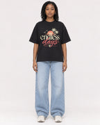 Mockup Boxy Heavyweight Tee Black female full-body 15