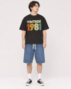 Mockup Boxy Heavyweight Tee Black male full-body 03