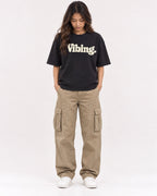 Mockup Boxy Heavyweight Tee Black female full-body 02