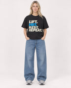 Mockup Boxy Heavyweight Tee Black female full-body 08