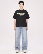 Mockup Boxy Heavyweight Tee Black female full-body 23
