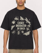 Mockup Boxy Heavyweight Tee Black male close-up 40