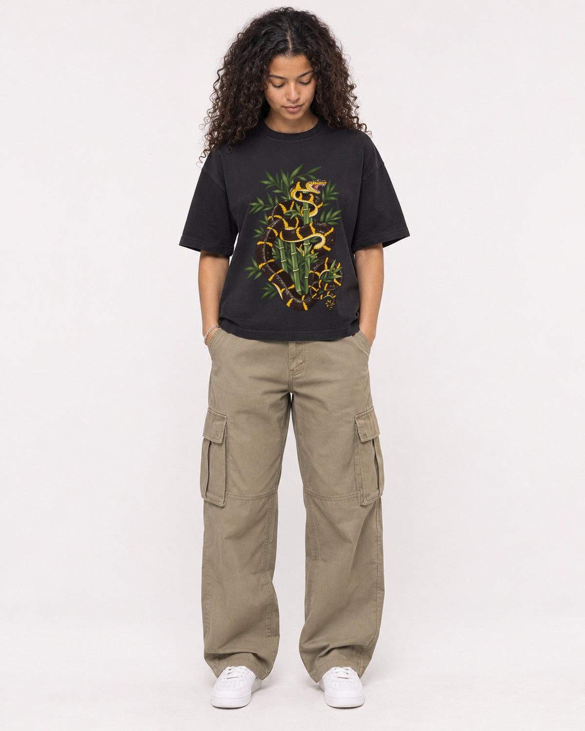 Mockup Boxy Heavyweight Tee Black female full-body 10