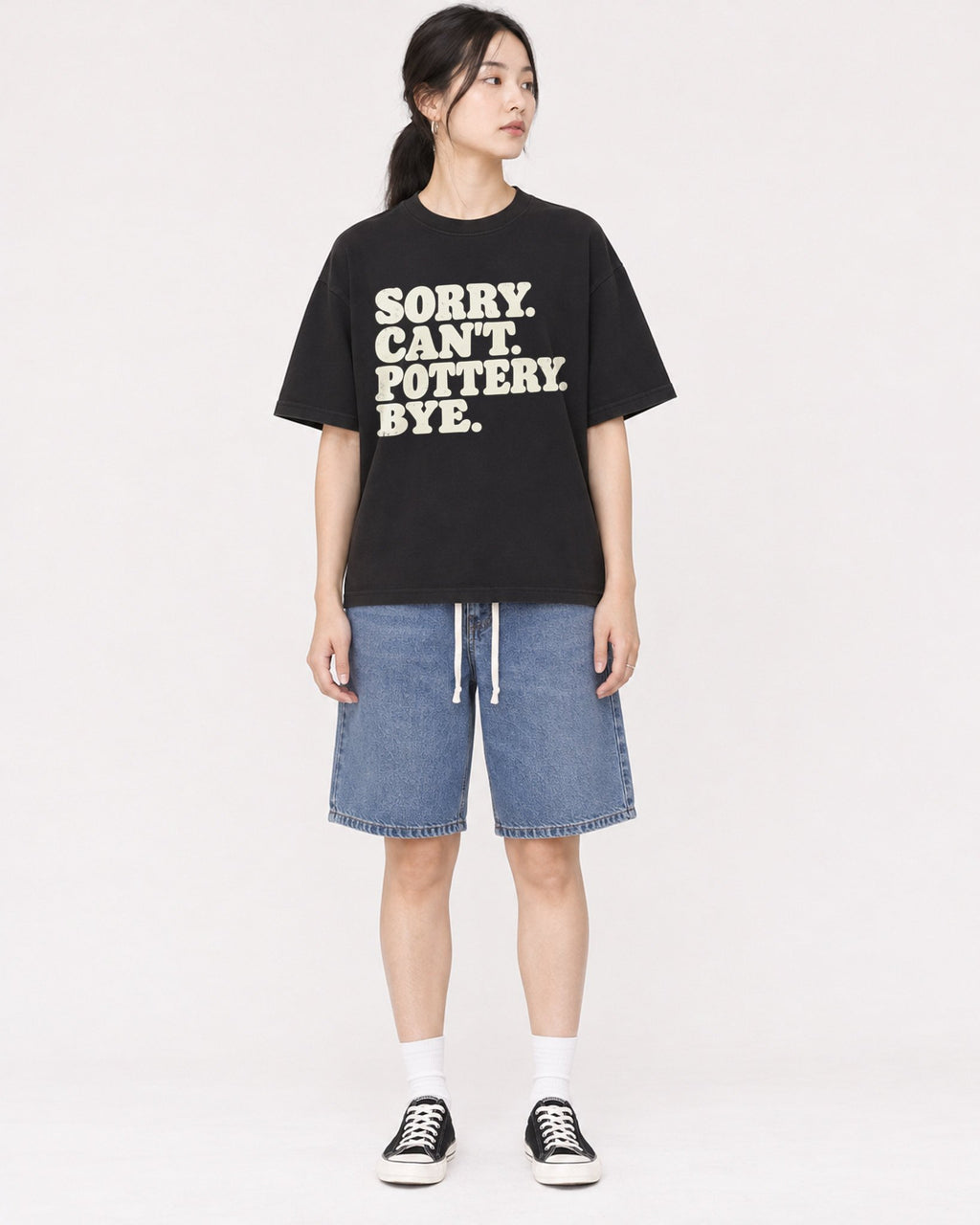 Mockup Boxy Heavyweight Tee Black female full-body 21