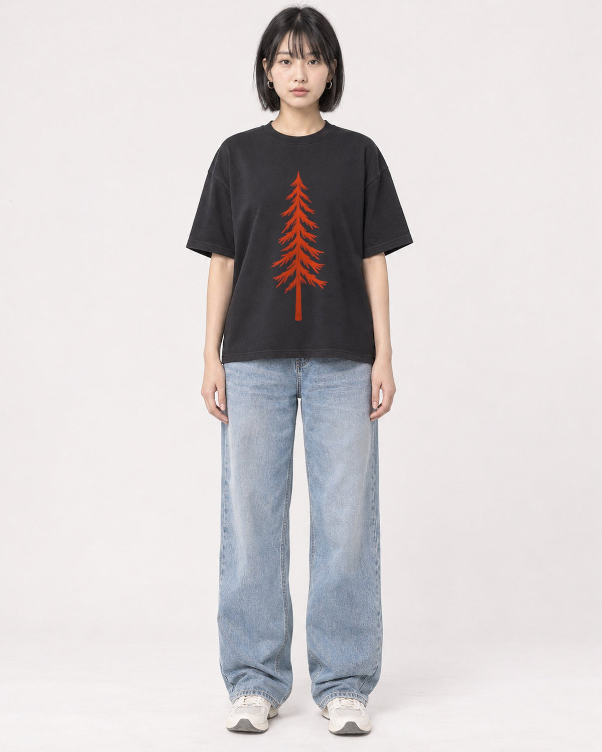 Mockup Boxy Heavyweight Tee Black female full-body 11
