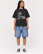 Mockup Boxy Heavyweight Tee Black female full-body 45