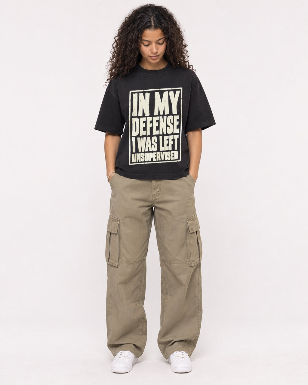 Mockup Boxy Heavyweight Tee Black female full-body 10