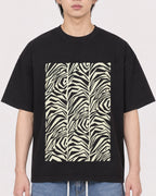 Mockup Boxy Heavyweight Tee Black male close-up 11