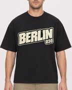 Mockup Boxy Heavyweight Tee Black male close-up 08