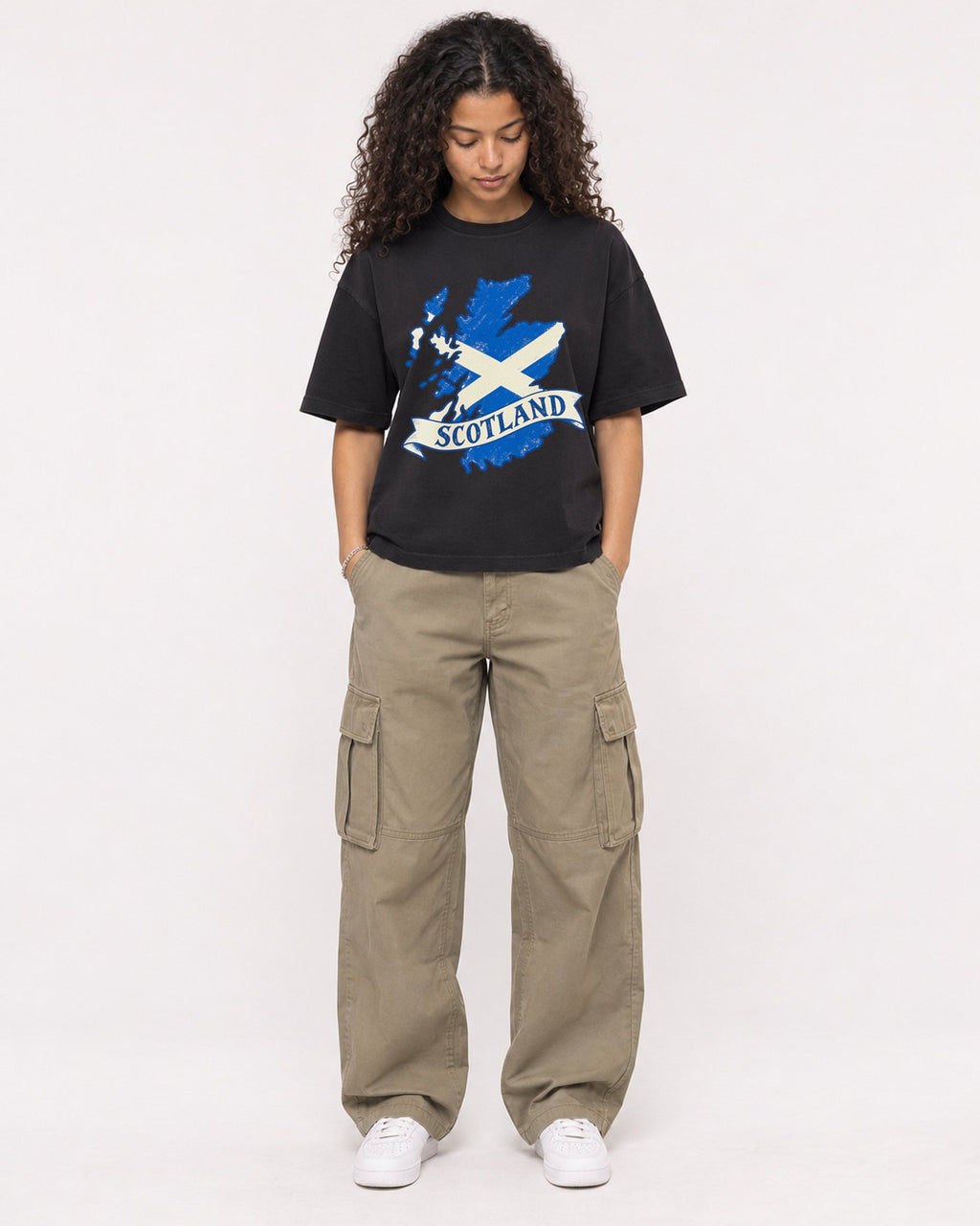 Mockup Boxy Heavyweight Tee Black female full-body 10