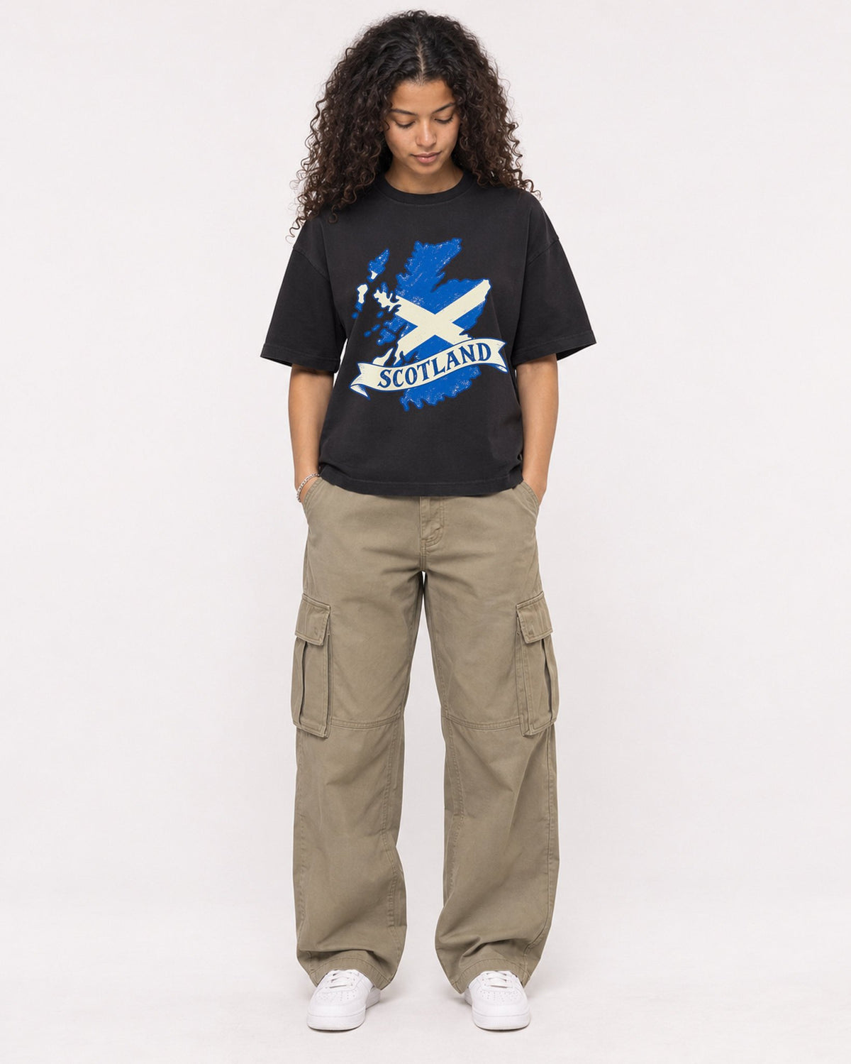 Mockup Boxy Heavyweight Tee Black female full-body 10