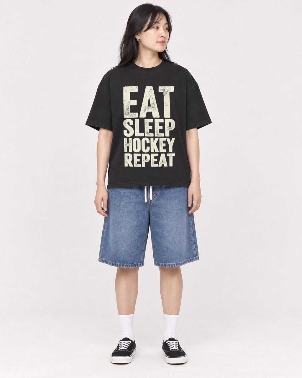 Mockup Boxy Heavyweight Tee Black female full-body 13