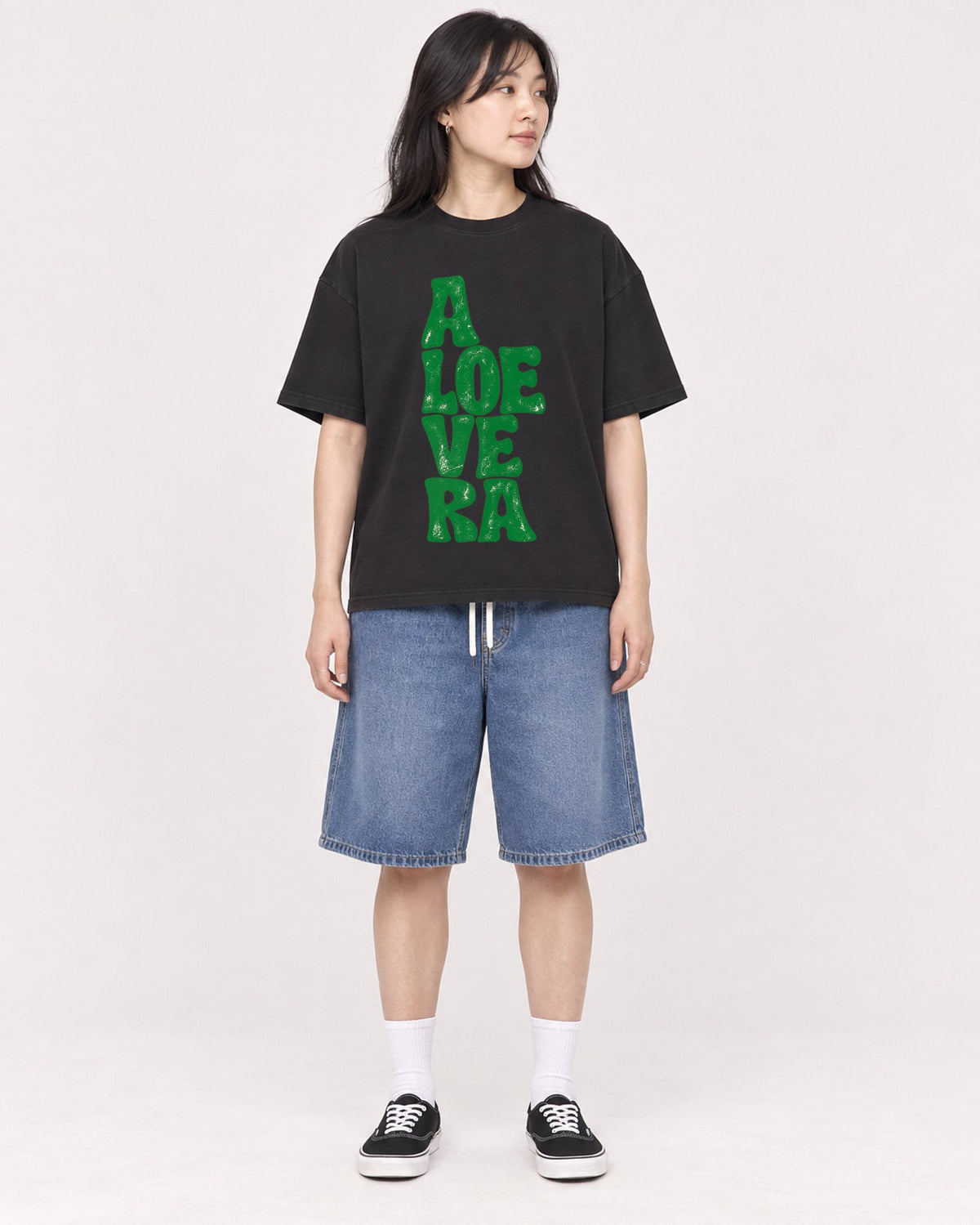 Mockup Boxy Heavyweight Tee Black female full-body 13