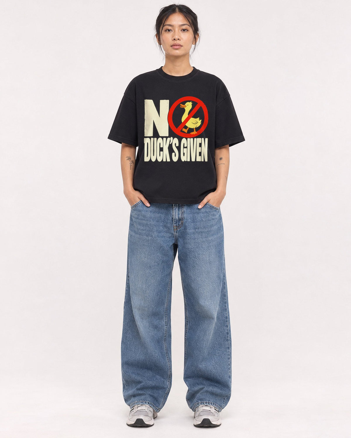 Mockup Boxy Heavyweight Tee Black female full-body 12