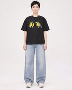 Mockup Boxy Heavyweight Tee Black female full-body 23