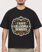 Mockup Boxy Heavyweight Tee Black male close-up 12