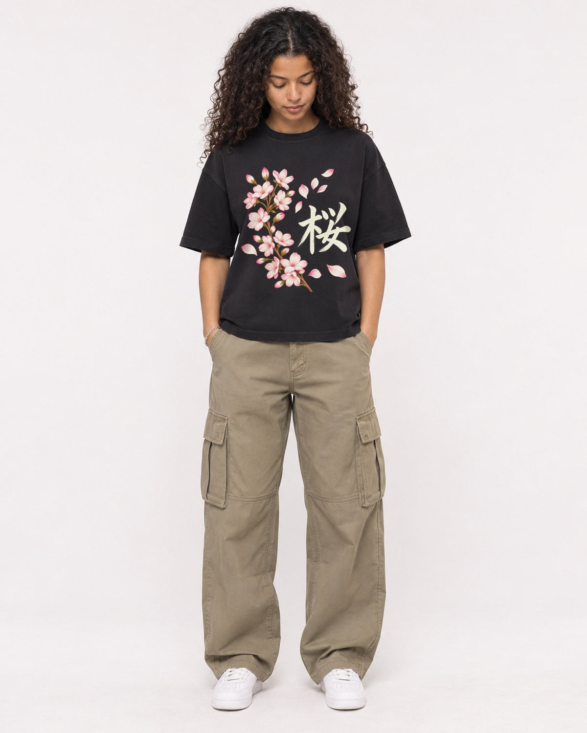 Mockup Boxy Heavyweight Tee Black female full-body 10