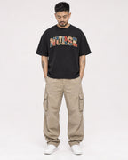 Mockup Boxy Heavyweight Tee Black male full-body 12