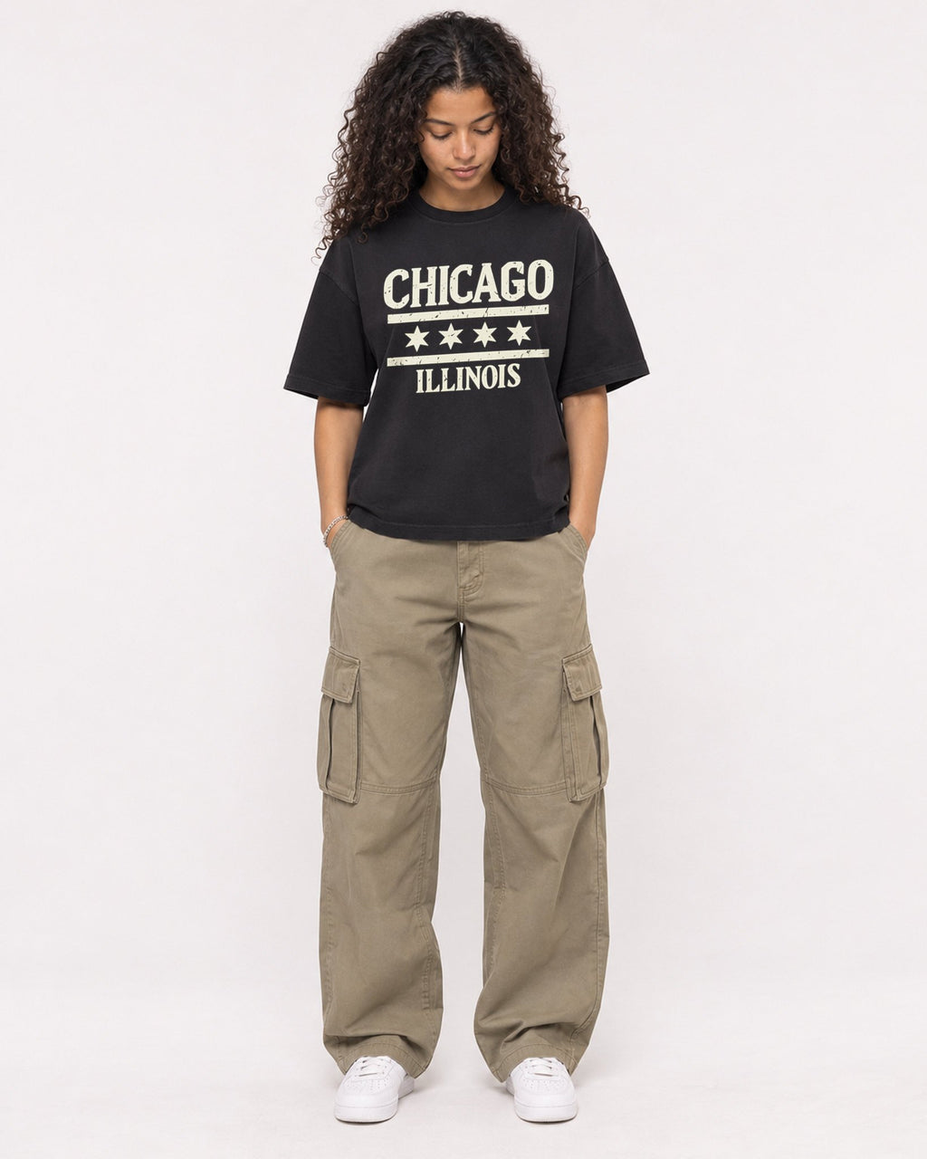 Mockup Boxy Heavyweight Tee Black female full-body 10