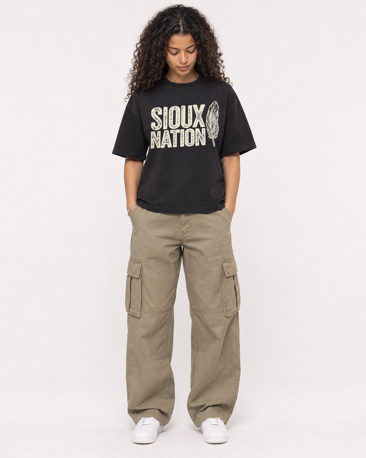 Mockup Boxy Heavyweight Tee Black female full-body 10