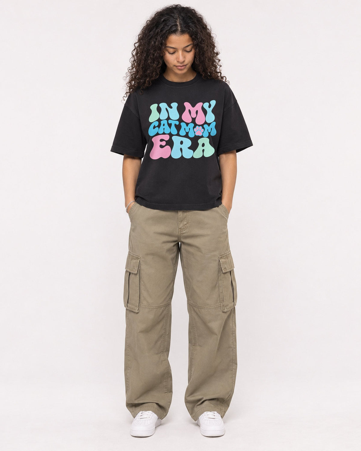 Mockup Boxy Heavyweight Tee Black female full-body 10