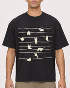 Mockup Boxy Heavyweight Tee Black male close-up 20