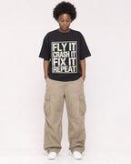 Mockup Boxy Heavyweight Tee Black female full-body 14