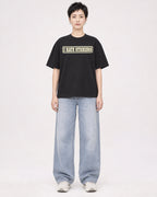Mockup Boxy Heavyweight Tee Black female full-body 23