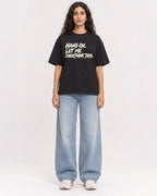 Mockup Boxy Heavyweight Tee Black female full-body 07