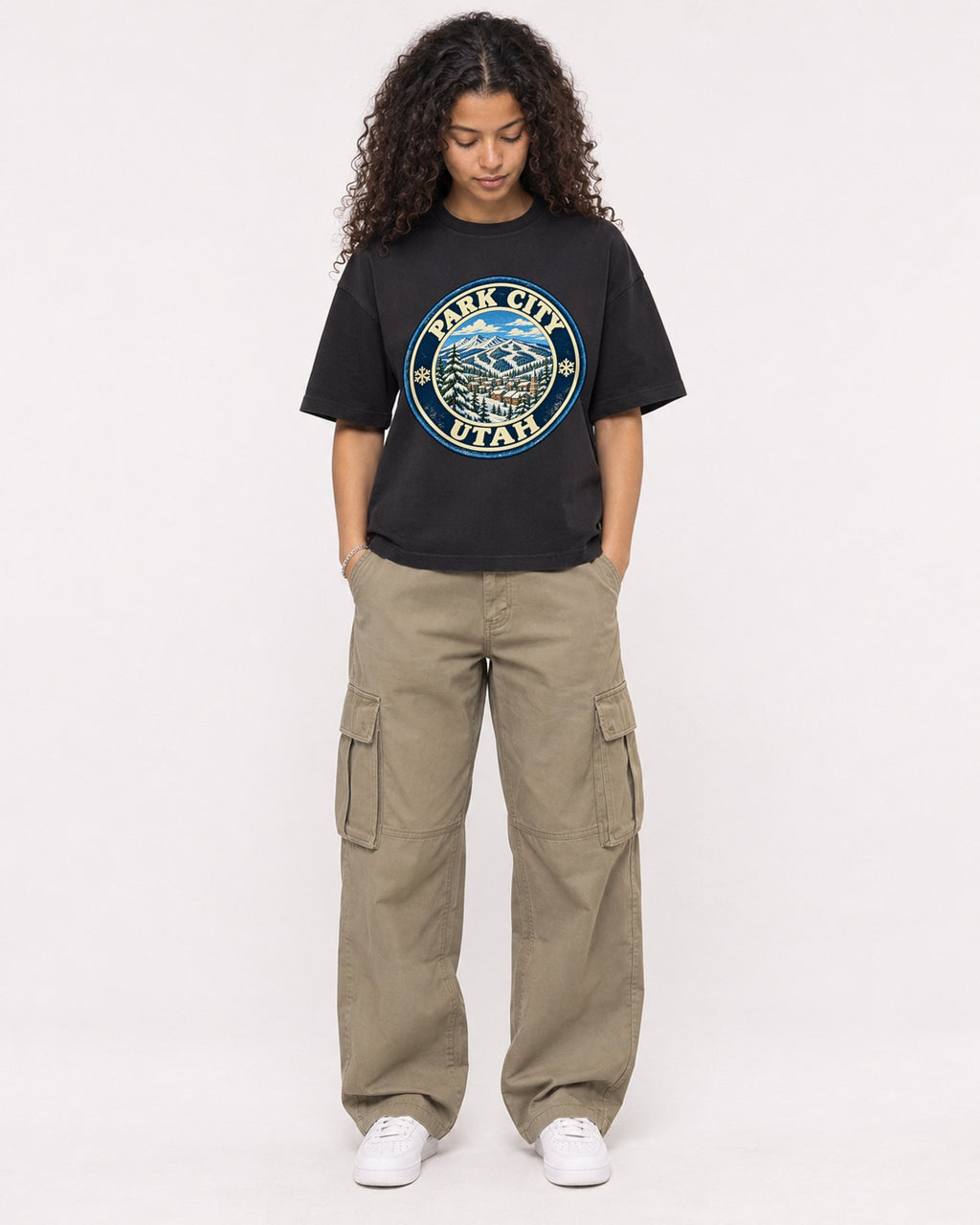 Mockup Boxy Heavyweight Tee Black female full-body 10