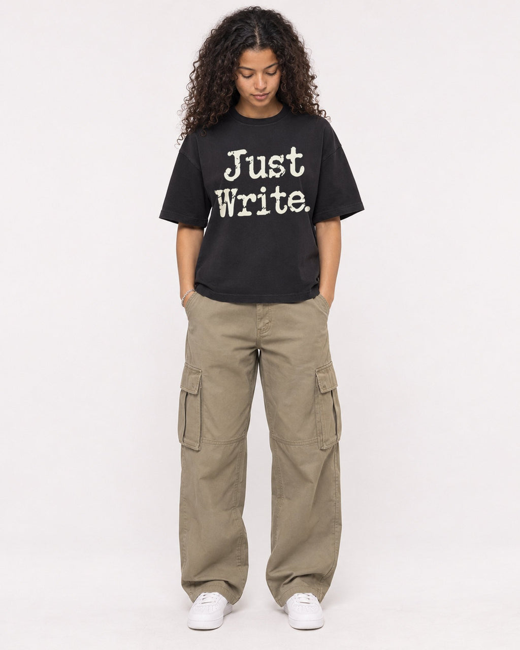 Mockup Boxy Heavyweight Tee Black female full-body 10