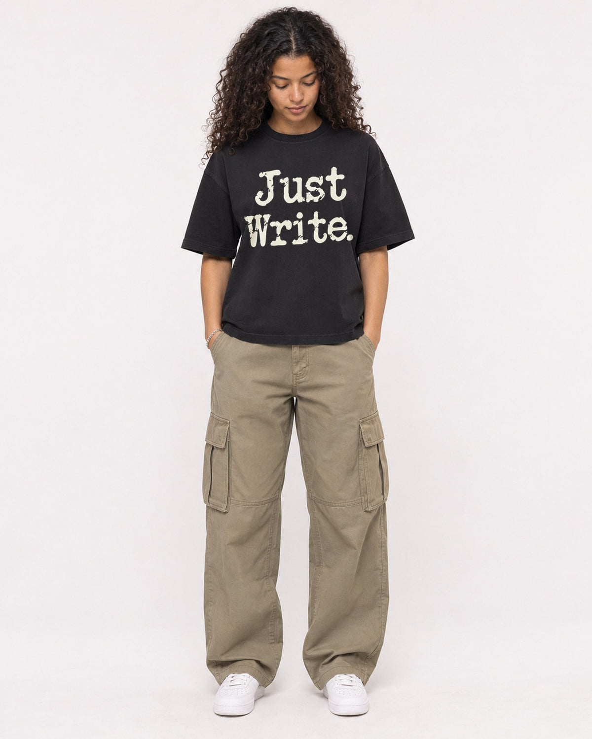 Mockup Boxy Heavyweight Tee Black female full-body 10