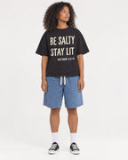 Mockup Boxy Heavyweight Tee Black female full-body 05