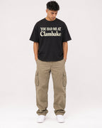 Mockup Boxy Heavyweight Tee Black male full-body 16