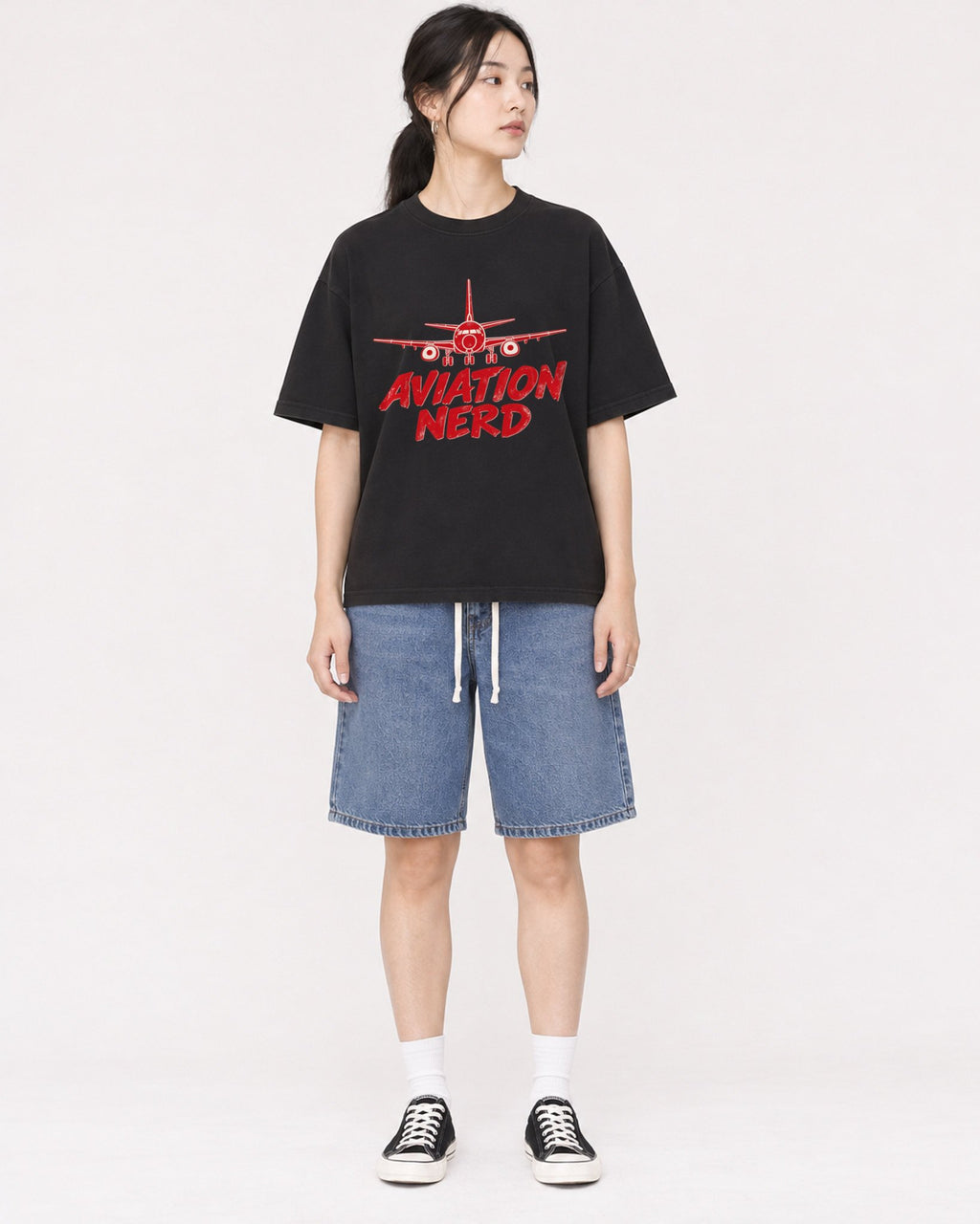Mockup Boxy Heavyweight Tee Black female full-body 21