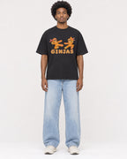 Mockup Boxy Heavyweight Tee Black male full-body 45