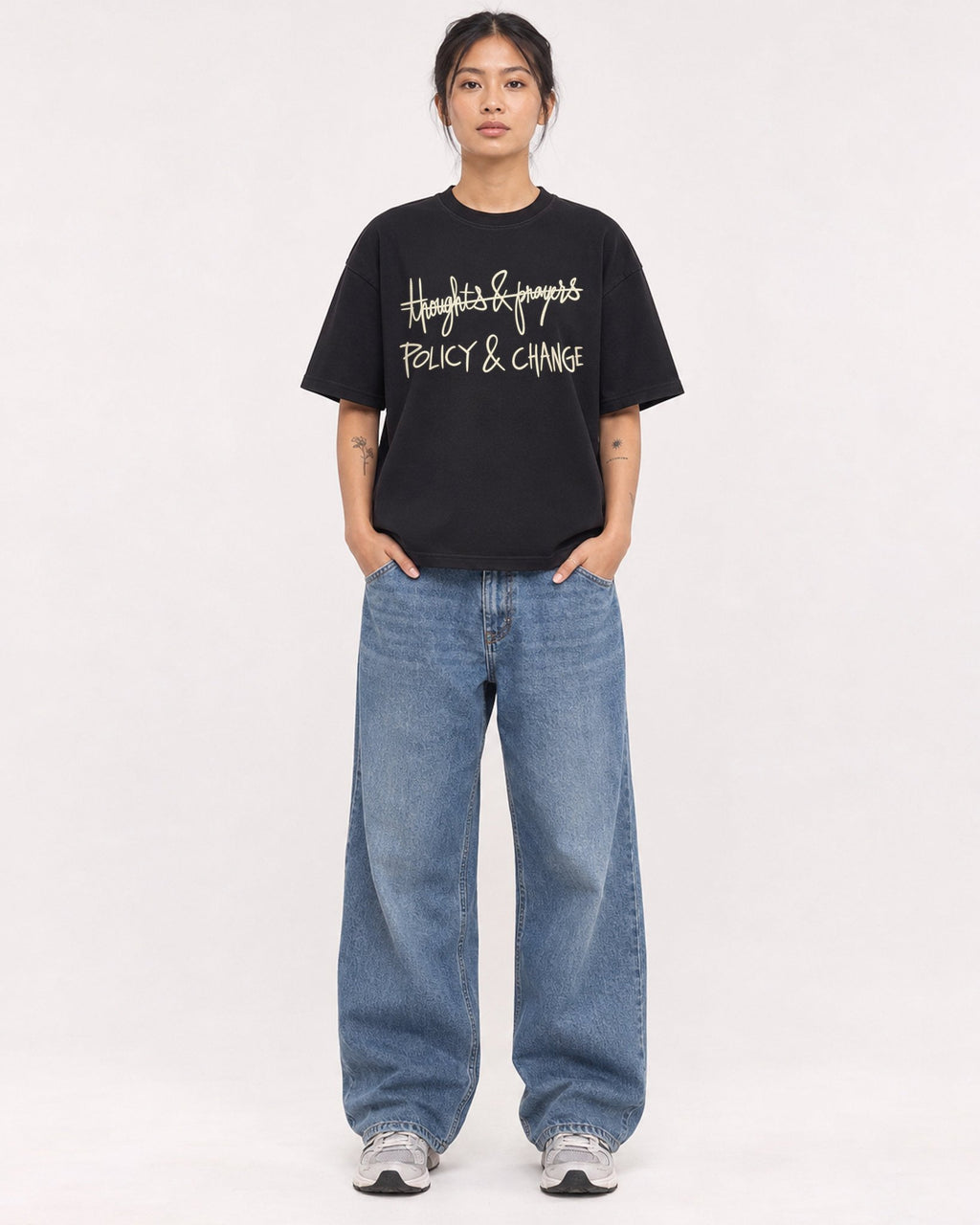 Mockup Boxy Heavyweight Tee Black female full-body 12