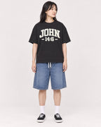 Mockup Boxy Heavyweight Tee Black female full-body 13