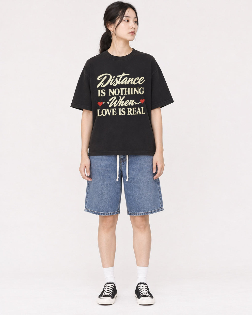 Mockup Boxy Heavyweight Tee Black female full-body 21