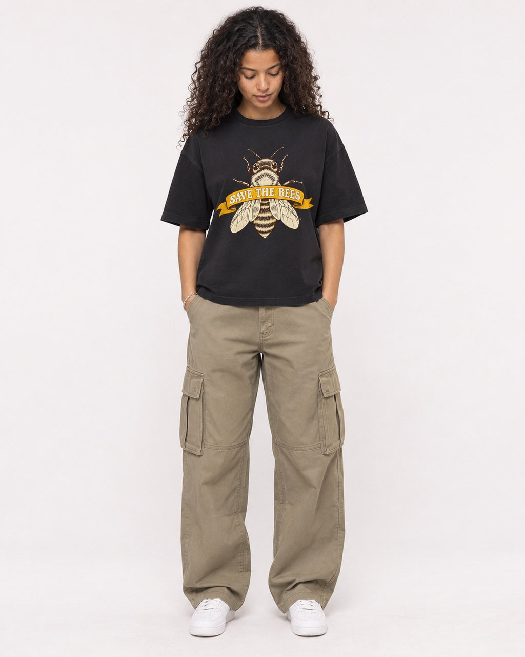 Mockup Boxy Heavyweight Tee Black female full-body 10