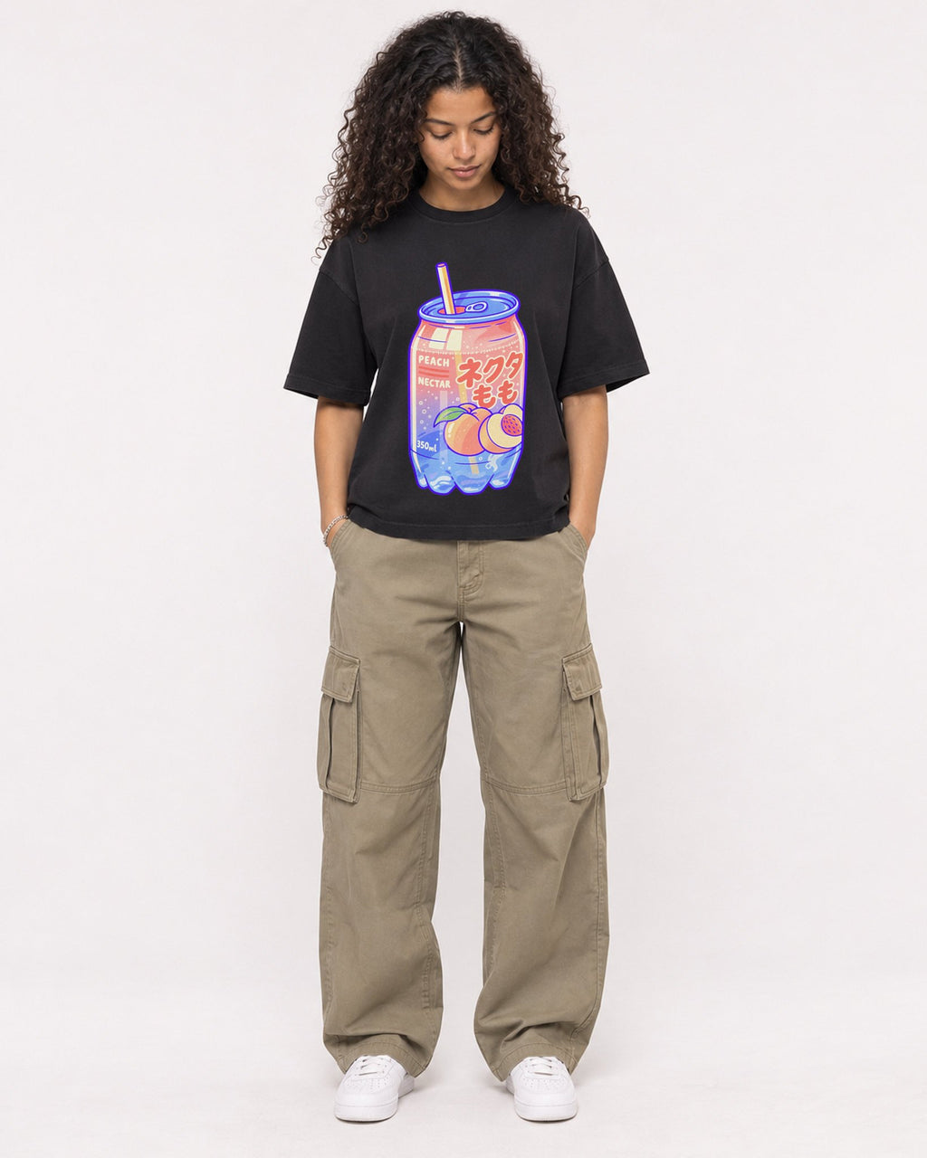 Mockup Boxy Heavyweight Tee Black female full-body 10