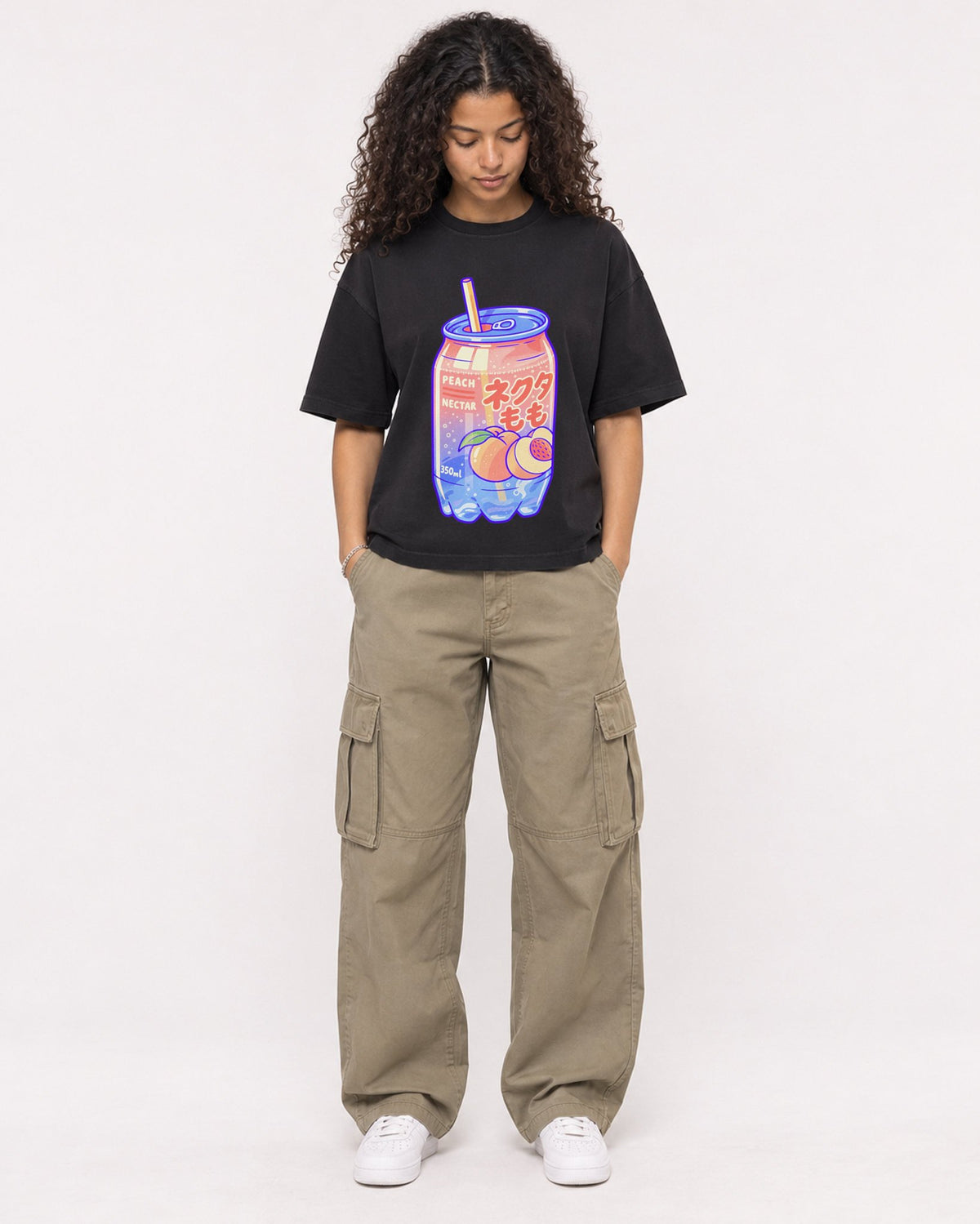 Mockup Boxy Heavyweight Tee Black female full-body 10